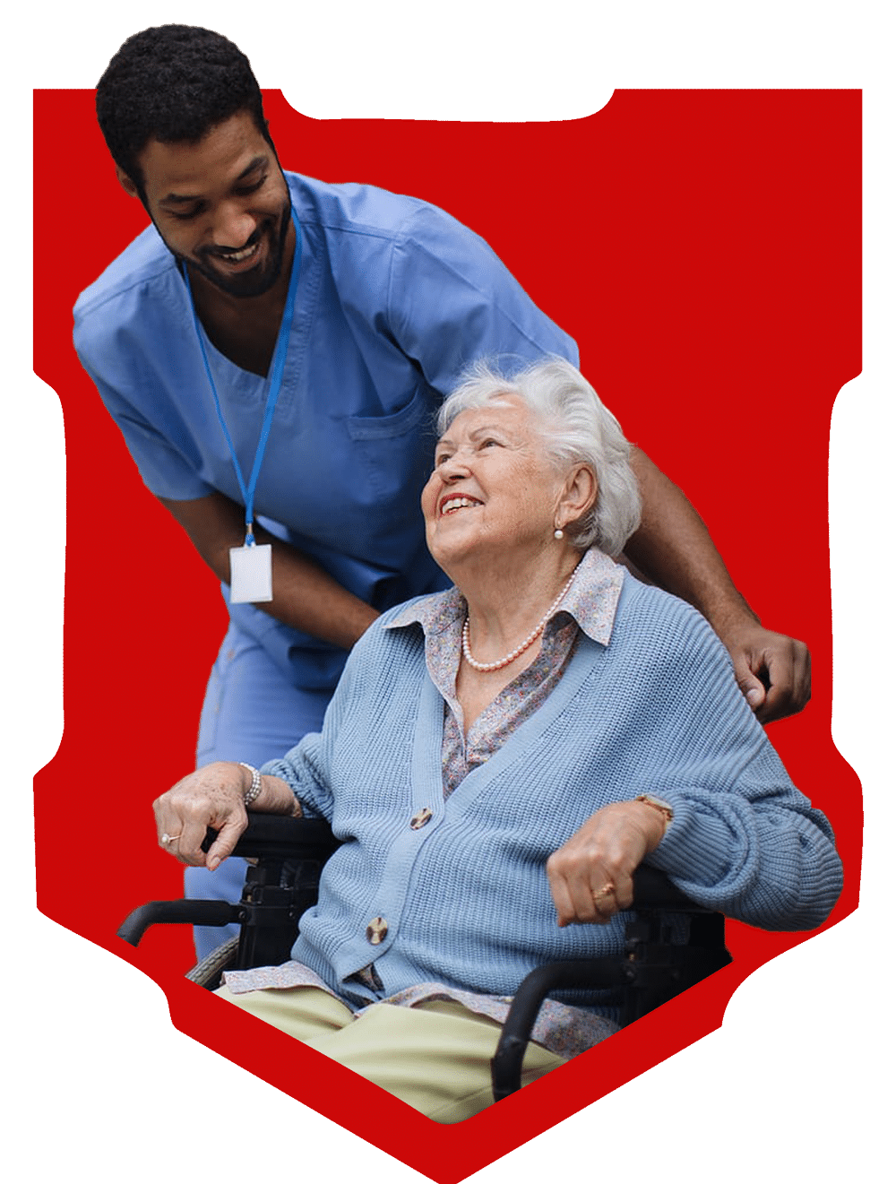 Caregiver smiling at elderly woman in wheelchair, emphasizing compassionate in-home support for veterans and seniors, reflecting Freedom Home Care's mission of professional care and well-being.
